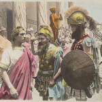 Frank, in the purple toga, 27 years old, as the despot Dionysius in a hand-colored publicity still from Damon and Pythias (1914). DAMON AND PYTHIAS
